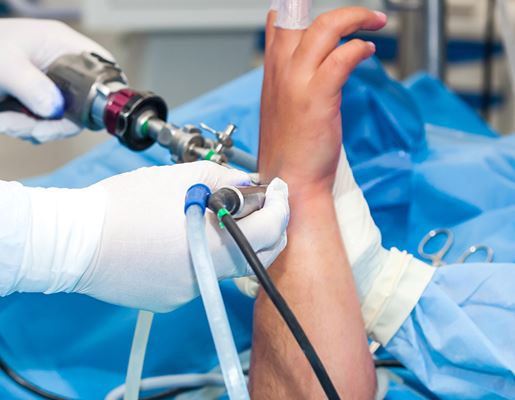 Patient recovering with small wrist bandages